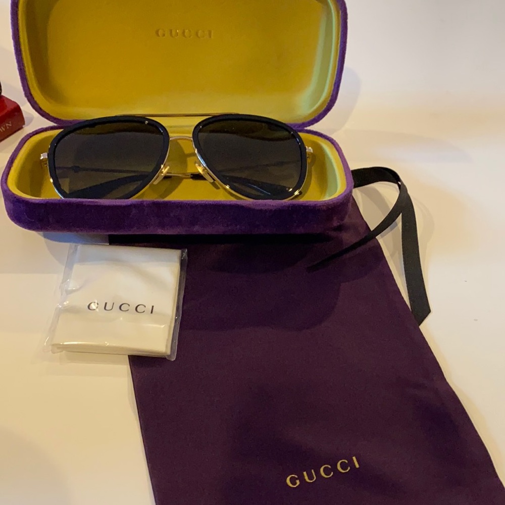 Gucci aviator sunglasses in gold-tone and black